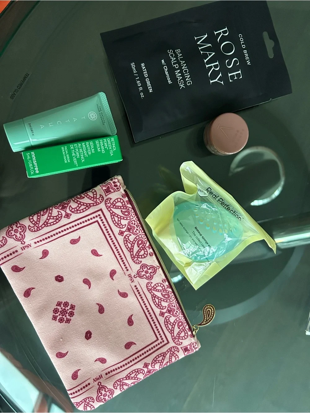 5 premium Skincare items trial size with a paisley charm pouch